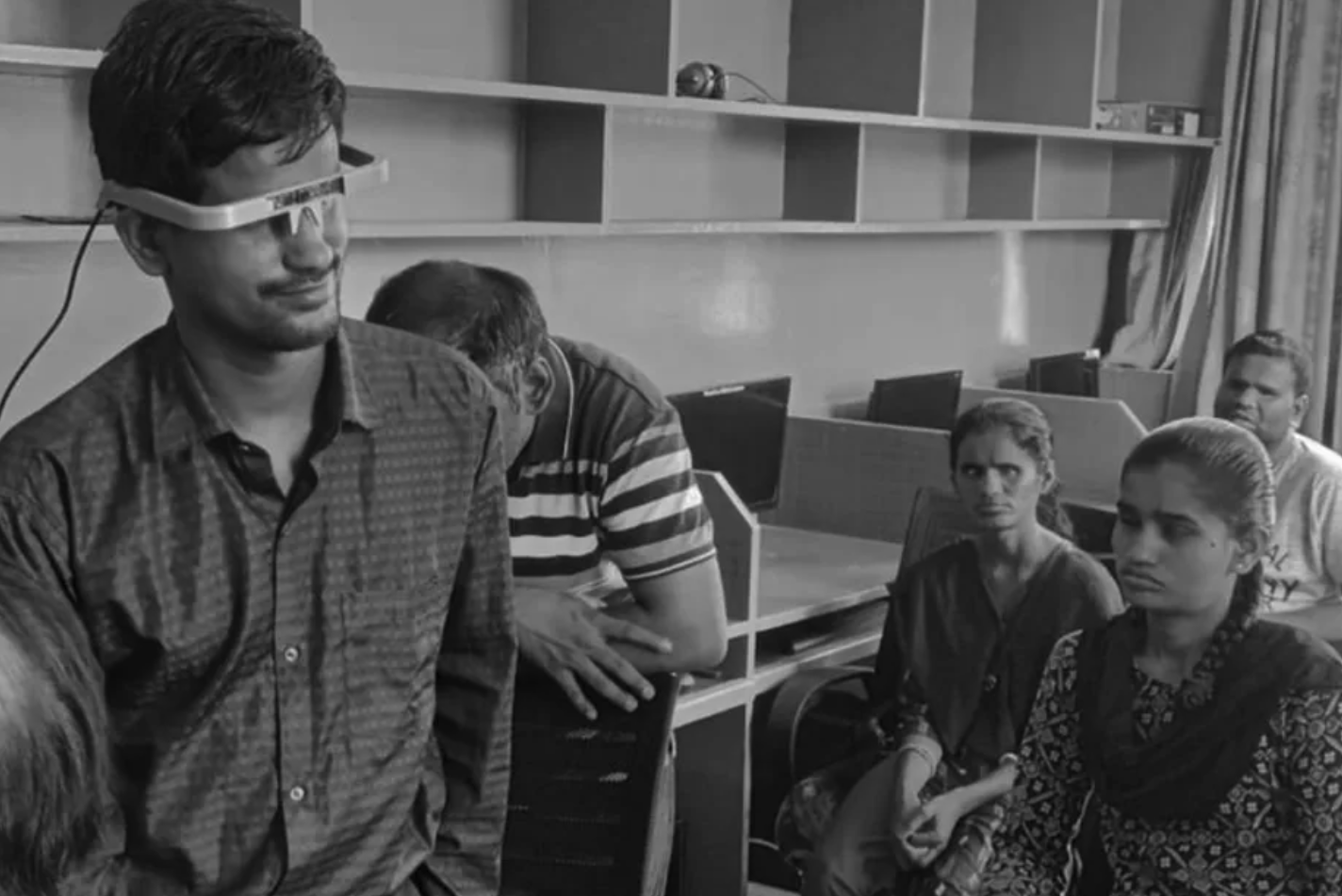 3Netra outreach session showing participants testing assistive smart glasses in a classroom setting